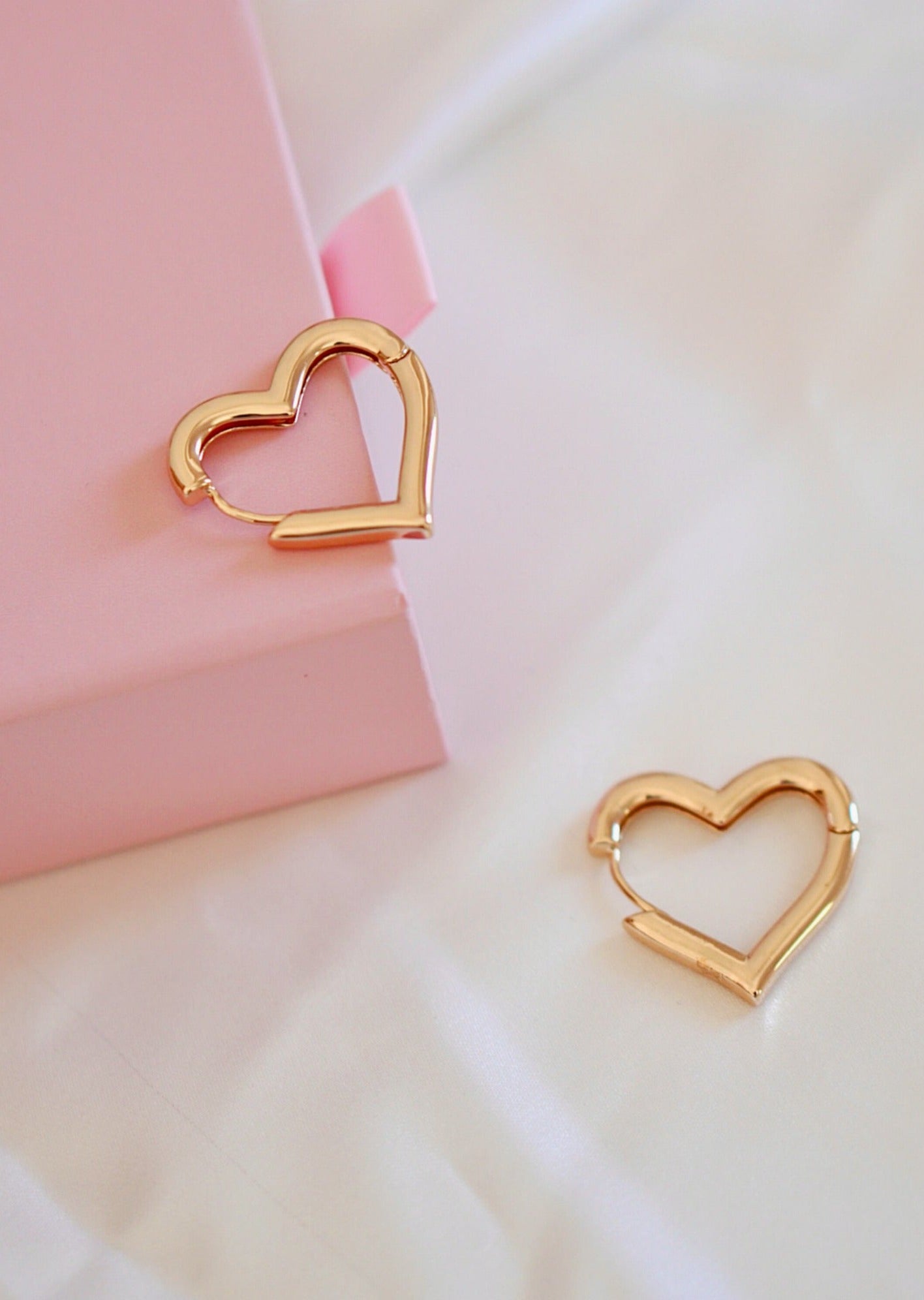 About love Huggie earrings