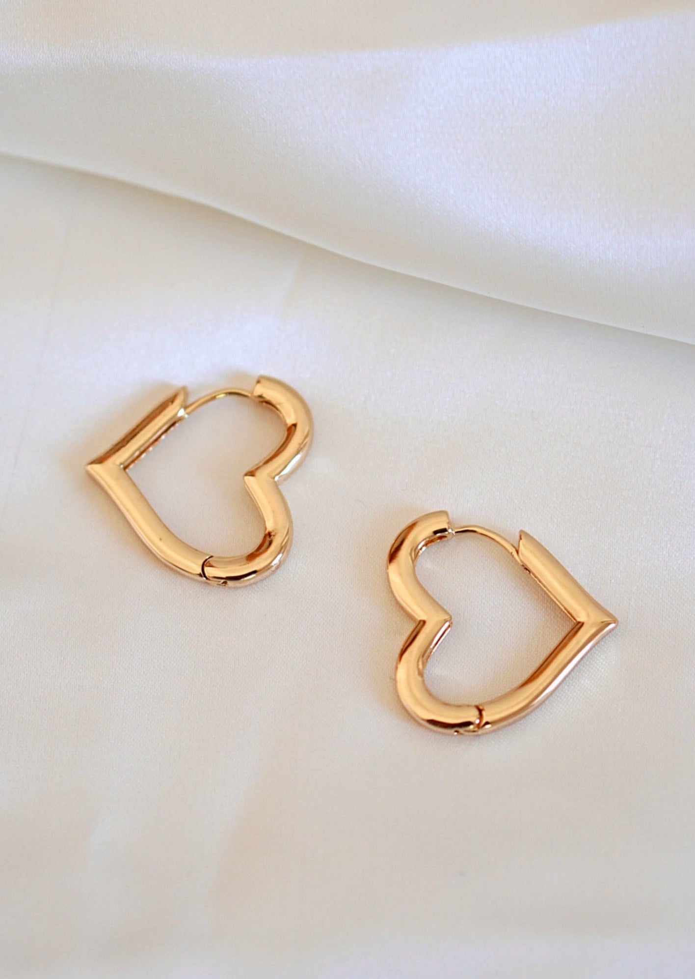About love Huggie earrings