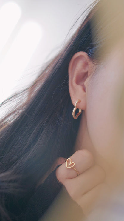 About love Huggie earrings